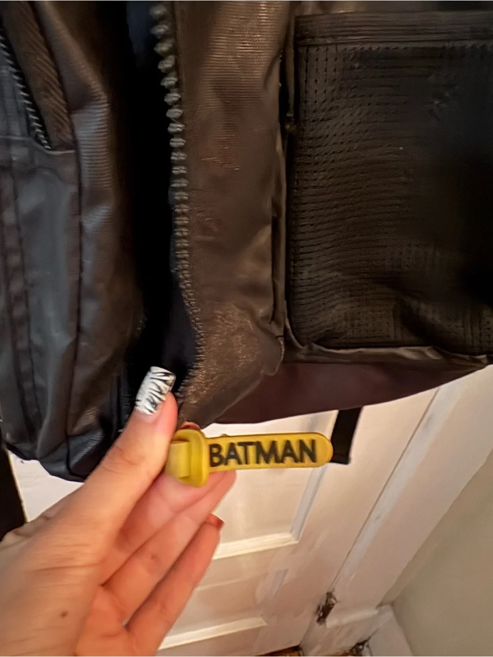 Black Backpack with Yellow Bat Emblem